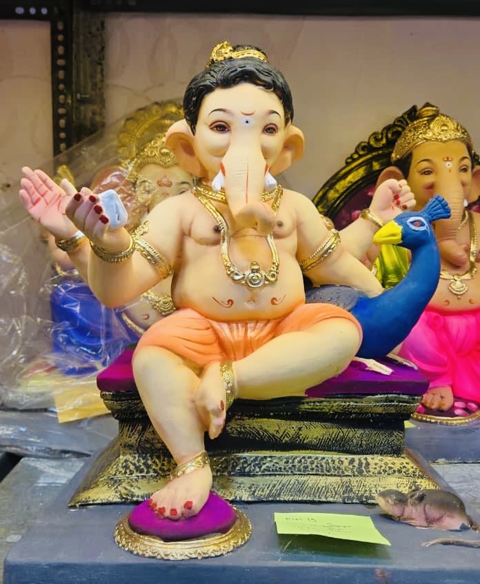 Bal Ganesh Murti with Peacock